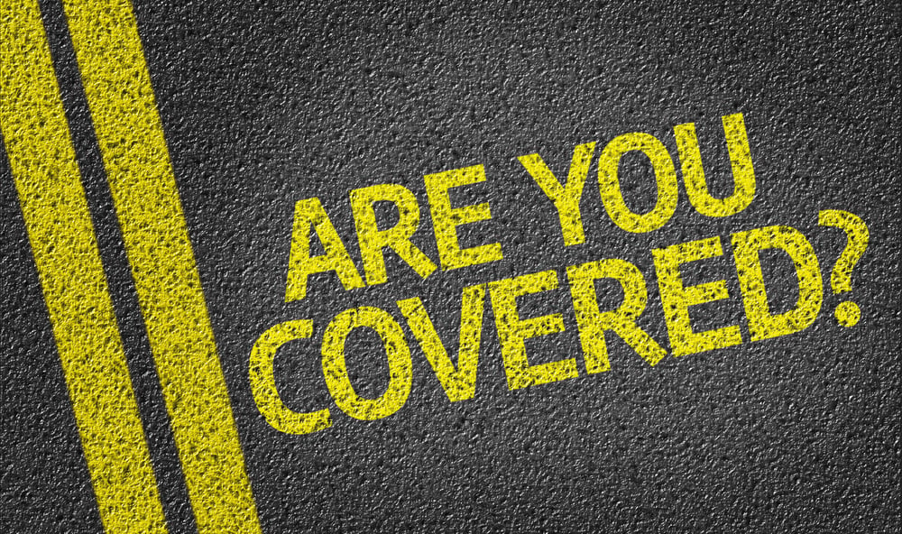 Are you Covered? written on the road